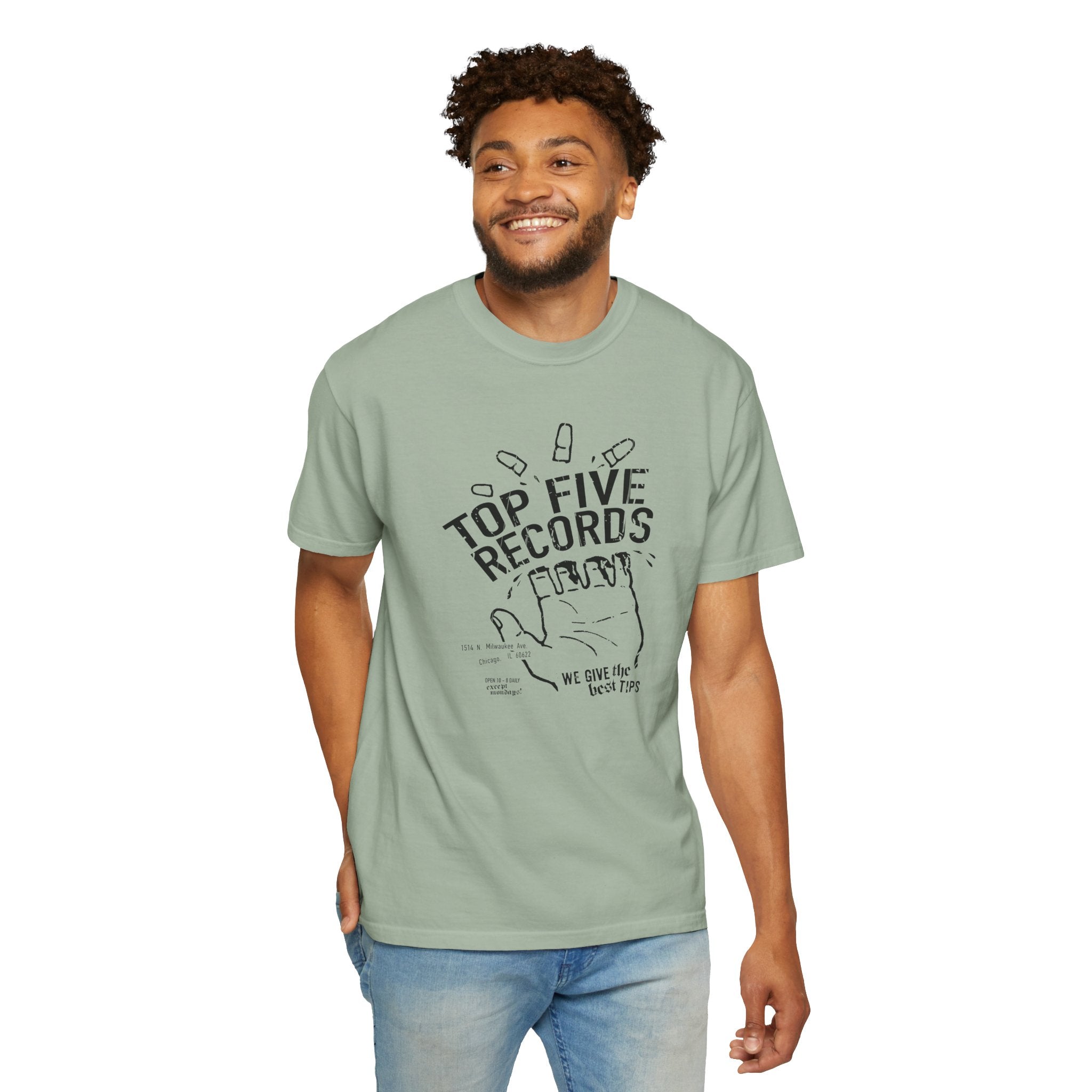 Man wearing a light green t-shirt with 'Top Five Records' graphic on a white background