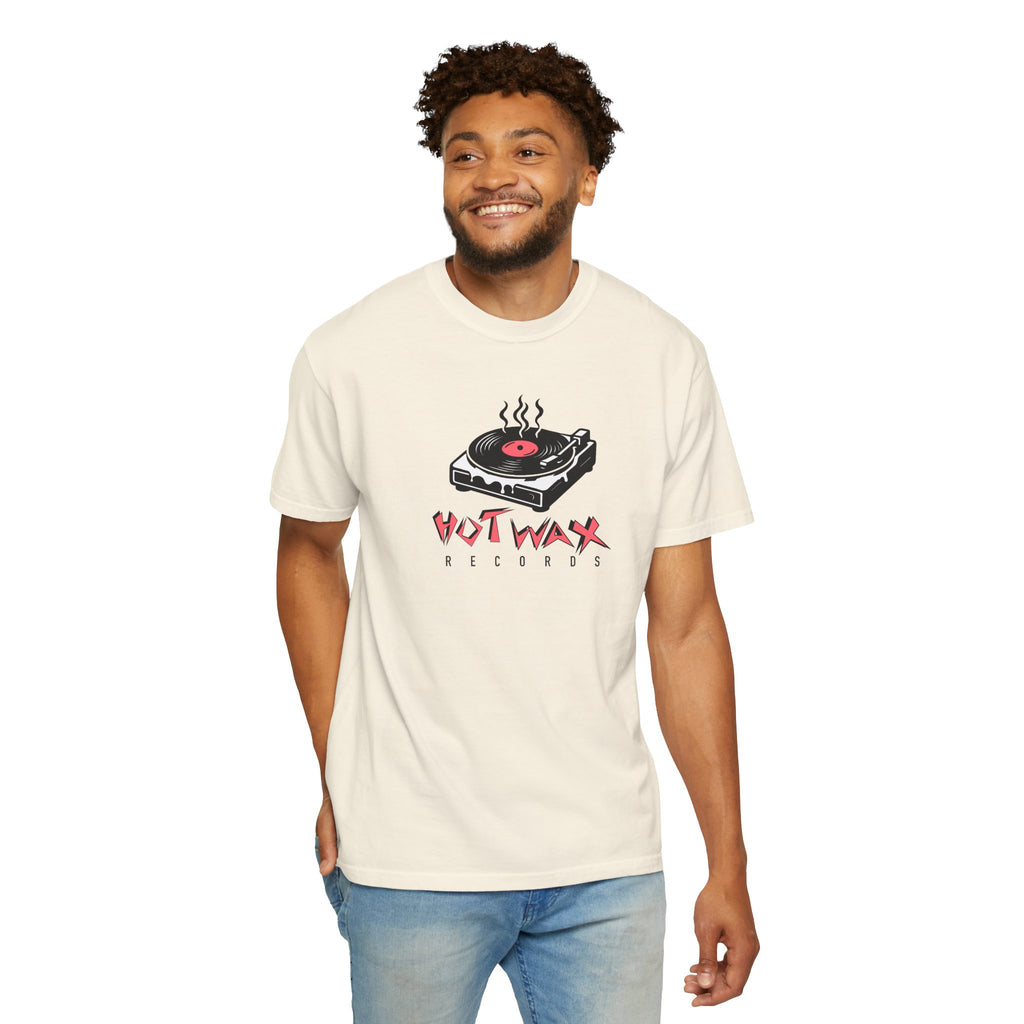 Man wearing a cream t-shirt with 'Hot Wax Records' graphic design on a white background