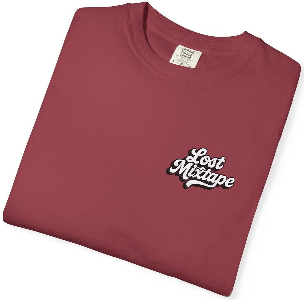 Folded maroon t-shirt with 'Lost Mixtape' text on a white background